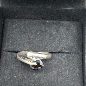 Elegant Silver Tone Ring with Black Heart